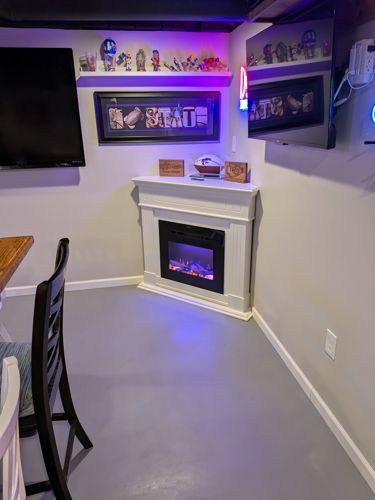 Added fireplace to basement bar - Cover